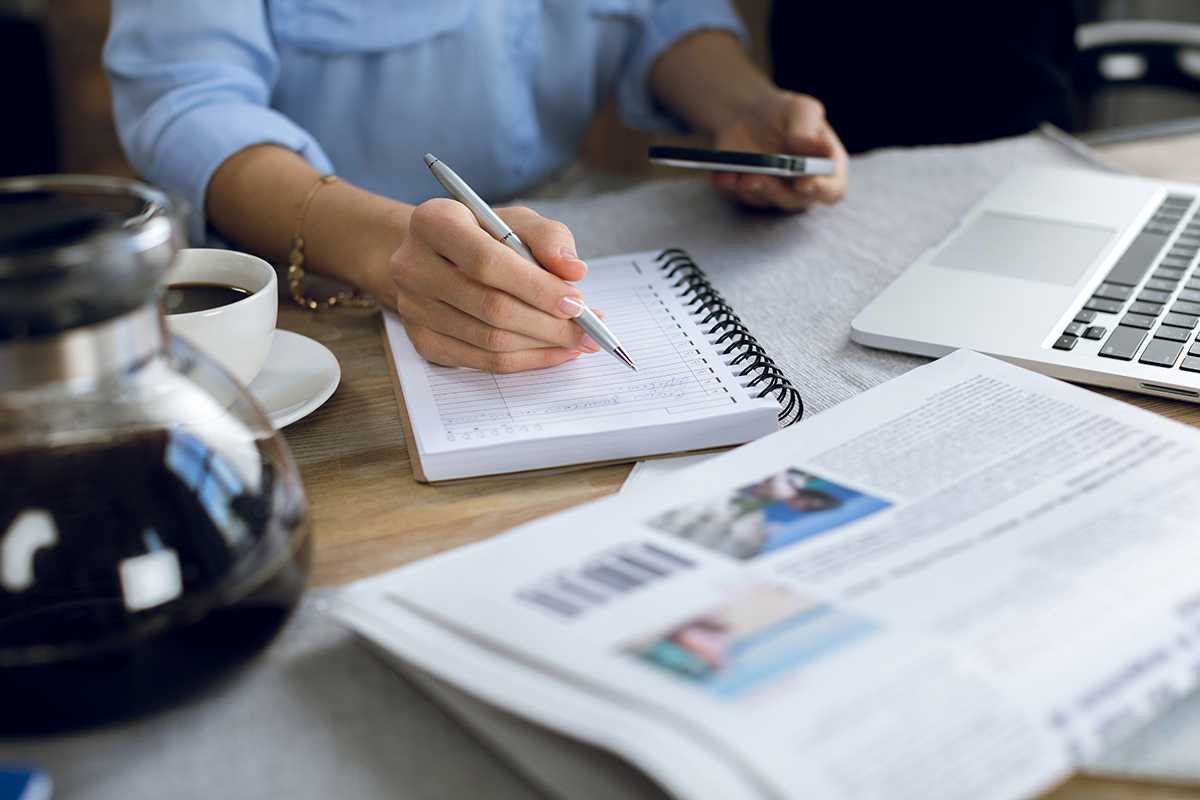 Woman taking notes